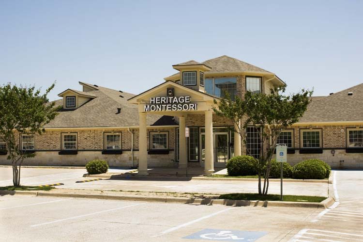 The Heritage Montessori building exterior in Murphy, Texas, with a covered front entrance and named portico