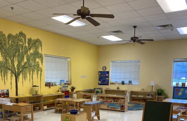 A toddler at work in the Magnolia and Willow classrooms